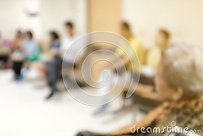 Abstract blur and defocused patients waiting to see doctor at hospital Stock Photo