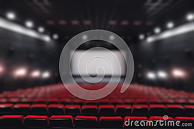 Abstract blur Empty rows of red theater or movie seats. Chairs in cinema hall. Comfortable armchair Stock Photo