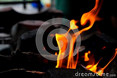 Abstract blur of flames, fire burning wood in stove Stock Photo