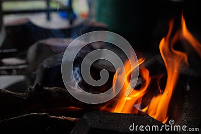 Abstract blur of flames, fire burning wood in stove Stock Photo