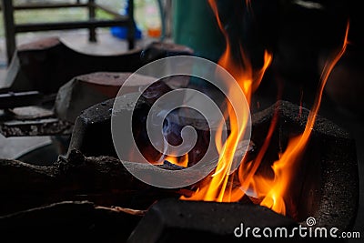 Abstract blur of flames, fire burning wood in stove Stock Photo