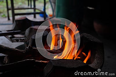 Abstract blur of flames, fire burning wood in stove Stock Photo