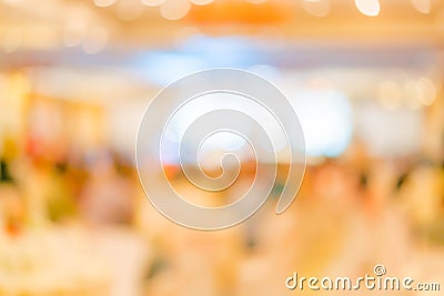 Abstract blur of wedding party in large hall . Stock Photo