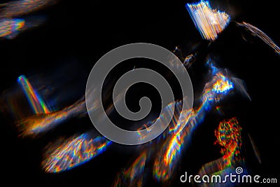 Abstract blurred colorful lens flare bokeh on black Stock Photo