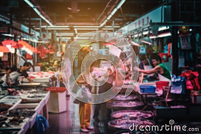 Abstract, blurred concept image of People buying and selling fish on seafood food market Editorial Stock Photo