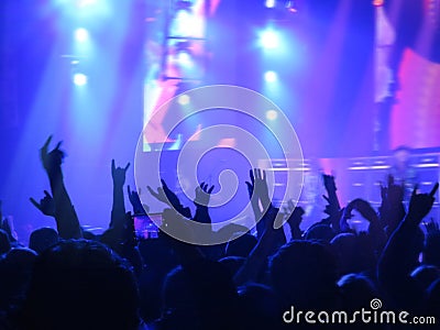 Abstract blurred image. Crowd during a entertainment public concert a musical performance. Hand fans in fun zone people Stock Photo