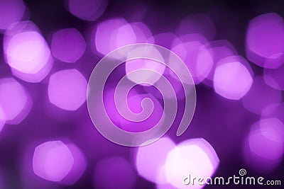 Blurred purple sparkling festive bokeh background Stock Photo