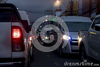 Abstract and blurred rear side of bickup car open light brake at night. Stock Photo