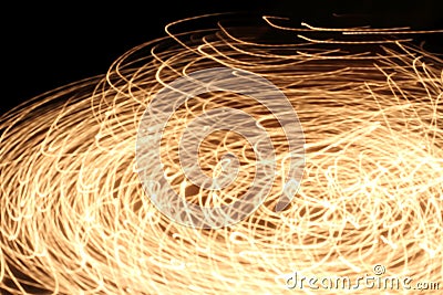 Abstract blurred swirl light lines on dark background Stock Photo