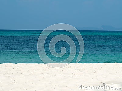 Abstract blurred on vacation summer ocean beach background. Clear blue sky, beautiful tropical sea, blue water and nice beach whit Stock Photo