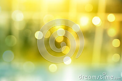 Abstract blurred yellow bokeh lights in festive decoration background Stock Photo