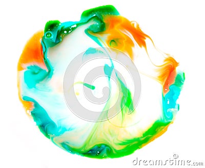 Abstract blurred yellow green texture of food dyes in milk. Multi-colored chaotic lines and streaks on the surface Stock Photo