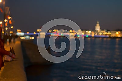 Abstract blurried lights over the night city river background. Beautiful sunset over Neva river of St. Petersburg, Russia Stock Photo