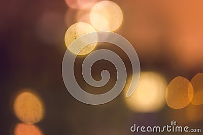 Abstract bokeh blurred background of warm night lights in yellow and orange tone Stock Photo