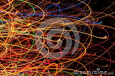 Abstract Bright Multicolored Glowing Lines and Curves on Black Background Stock Photo