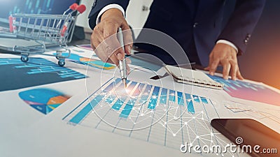 Abstract, Businessman drawing global structure networking connection on growth graph documents, Business strategy and planning Stock Photo
