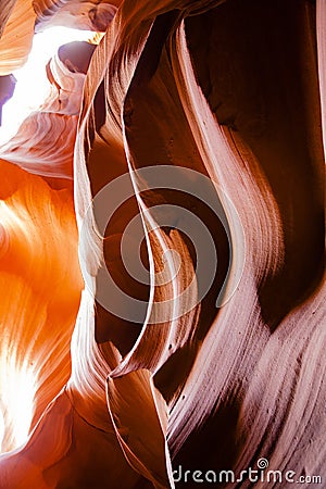 Abstract Canyon Shapes: Orange and Mauve Waves Stock Photo