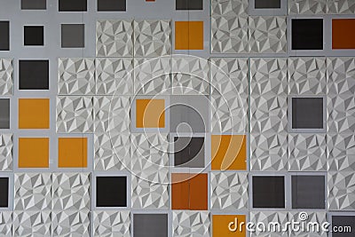 Abstract ceramic wall tiles in the shape of pyramid background Stock Photo