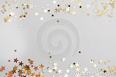 Abstract Christmas background with golden glitter over white board Stock Photo