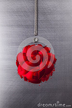 Abstract Christmas bauble and silver metal string on steel background Stock Photo