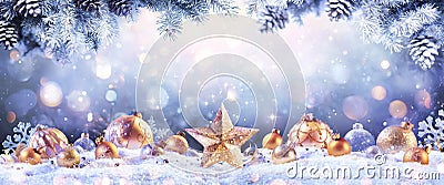 Abstract Christmas Card - Golden Ornament On snow Stock Photo