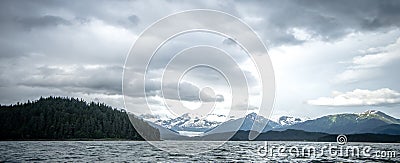 Abstract cloudy waterscape AND MOUNTAIN RANGE IN ALASKA Stock Photo