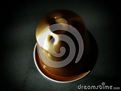 Abstract of Coffee Capsule with Dark Background Stock Photo