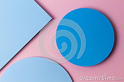 Abstract colored paper texture background. Minimal geometric shapes and lines in pastel pink, light blue and blue Stock Photo