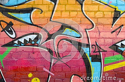 Abstract colorful fragment of graffiti paintings on old brick wall. Street art composition with parts of unwritten letters and Editorial Stock Photo