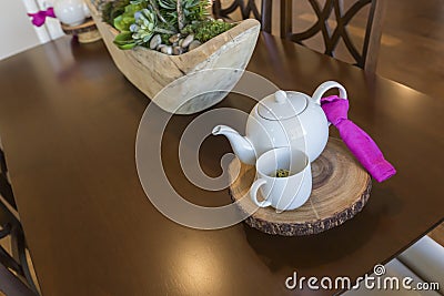 Abstract of Colorful Inviting Table Setting with Tea Kettle Stock Photo