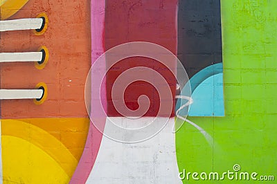 Abstract, Colorful Painting on a Brick Wall Editorial Stock Photo