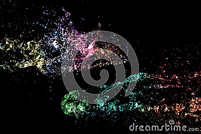 Abstract colorful Water splash isolated on black Stock Photo
