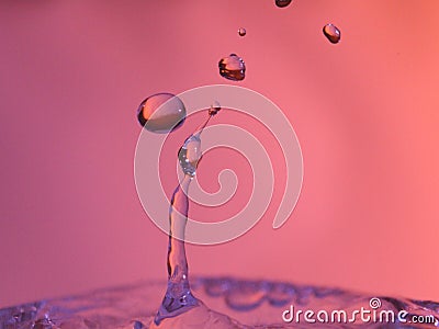 Abstract Colors colliding drops different fluids funds forms Stock Photo