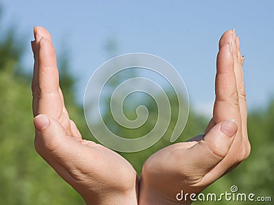 Abstract conception with hands towards sky Stock Photo