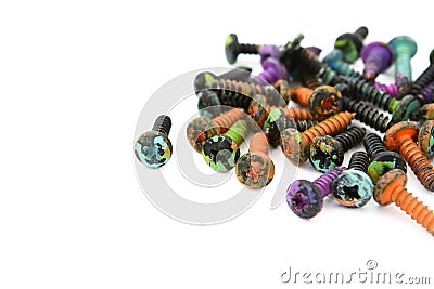 Abstract of crosshead screws, covered in paint splatters Stock Photo