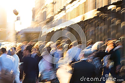 Abstract crowd of blurred people walking down street in New York City Stock Photo