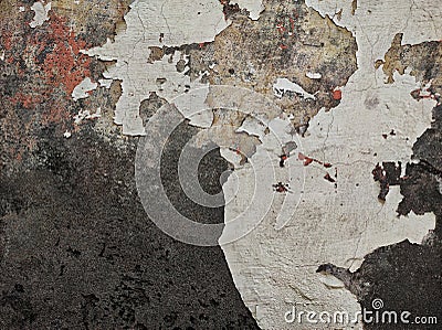 Abstract Dark Grunge wall texture background. Paint cracking off dark wall with rust underneath.distressed crackled texture. Stock Photo