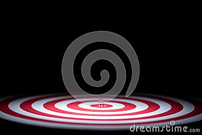 Abstract dartboard on dark background lighted with snoot Stock Photo