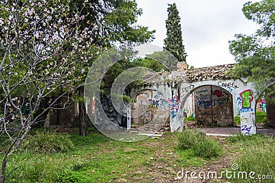 Abstract face wall painting at an abandoned old villa at Pallini, Greece Editorial Stock Photo