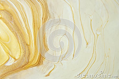 Abstract fluid art background yellow and golden colors. Liquid marble. Acrylic painting with ocher gradient and splash Stock Photo