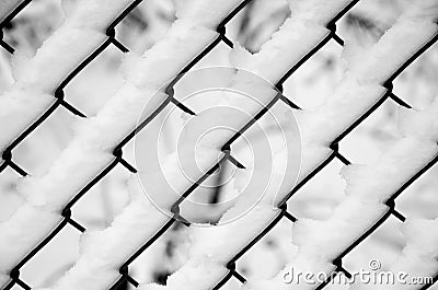 Abstract Fresh Winter Snow on Wired Fence Pattern Stock Photo