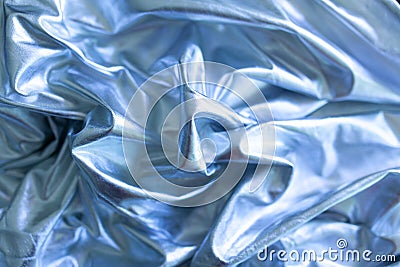 Abstract futuristic looking light blue texture background. silk sheets texture. Satin linens Stock Photo