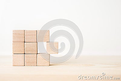 Abstract geometric real wooden cube with surreal layout on white floor background and it`s not 3D render. It`s the symbol of lea Stock Photo