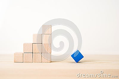 Abstract geometric real wooden cube with surreal layout on white floor background and it`s not 3D render. It`s the symbol of opp Stock Photo