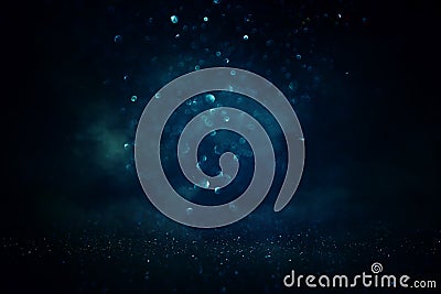 Abstract glitter black and blue lights background. de-focused Stock Photo