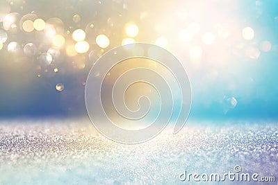 Abstract glitter lights background. golden and light blue. de-focused Stock Photo