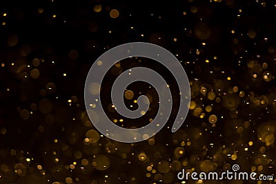 Abstract gold bokeh with black background Stock Photo