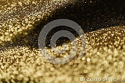 Abstract bokeh light on golden elegant background Stock Photo