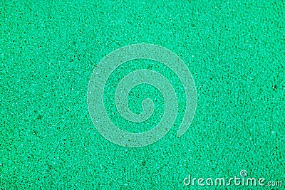 Abstract green background. Porous surface, sponge. Stock Photo