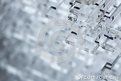 Abstract high-tech background. Details of transparent plastic or glass. Laser cutting of plexiglass. Stock Photo